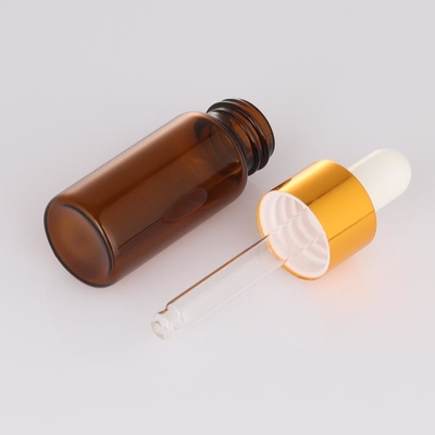 पाले सेओढ़ लिया 5ml 10ml खाली कॉस्मेटिक बोतल एम्बर ड्रॉपर गोल चेहरा सीरम बोतल